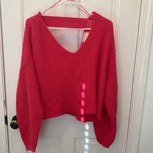 Urban Outfitters dark pink low v neck sweater. Size large. Only worn once.